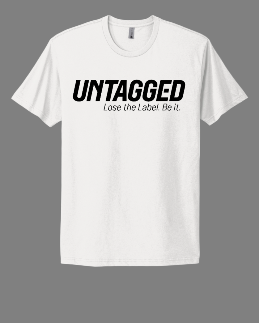 White t-shirt with 'UNTAGGED Lose the Label. Be it.' text on a white background