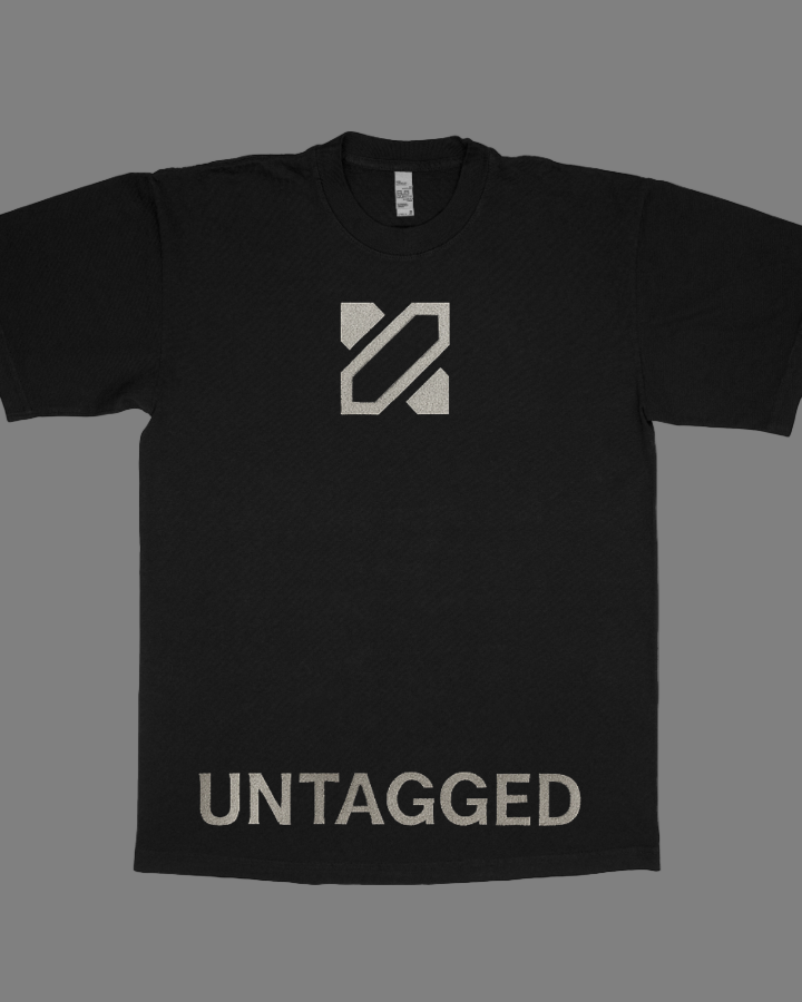 Black t-shirt with a logo and 'UNTAGGED' text on a white background