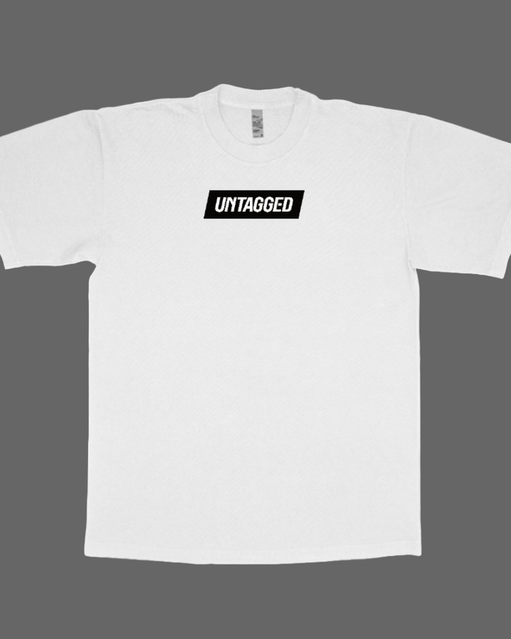 White t-shirt with 'UNTAGGED' logo on a white background