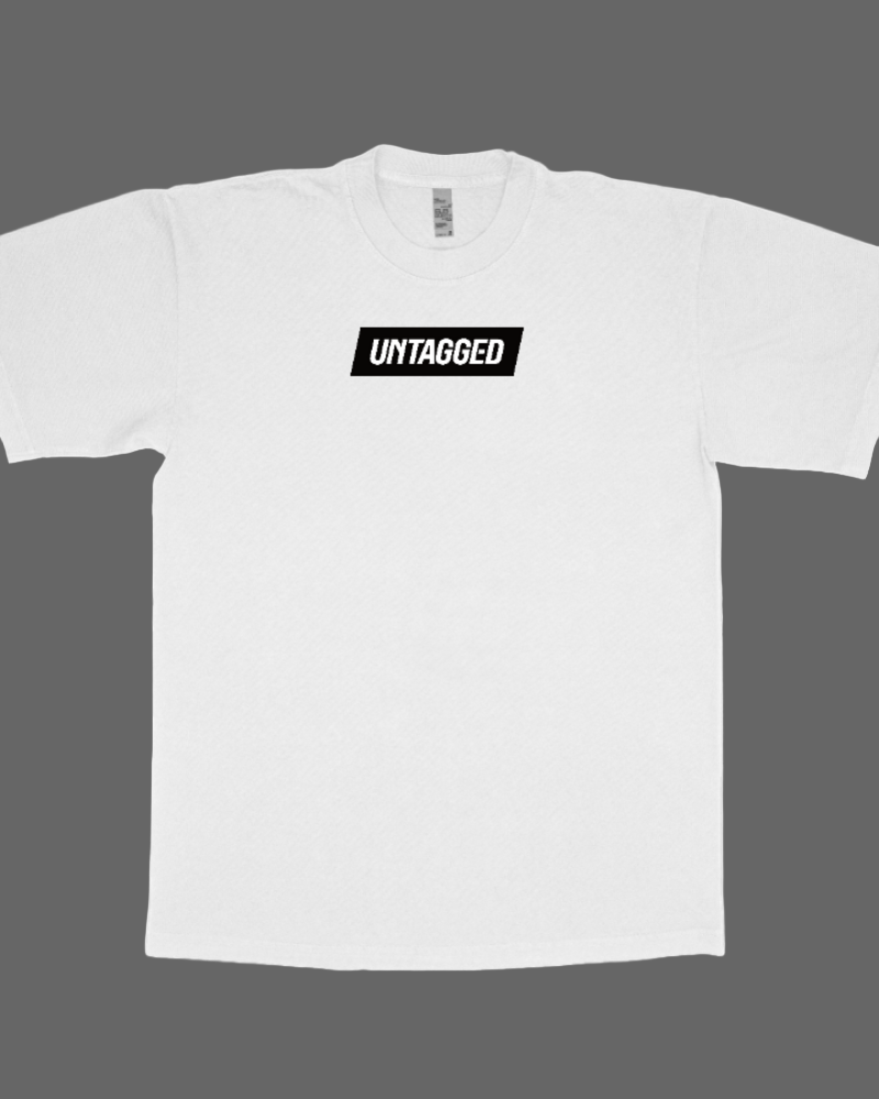 White t-shirt with 'UNTAGGED' logo on a white background