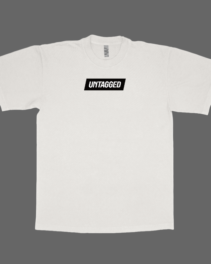White t-shirt with 'UNTAGGED' logo on a white background