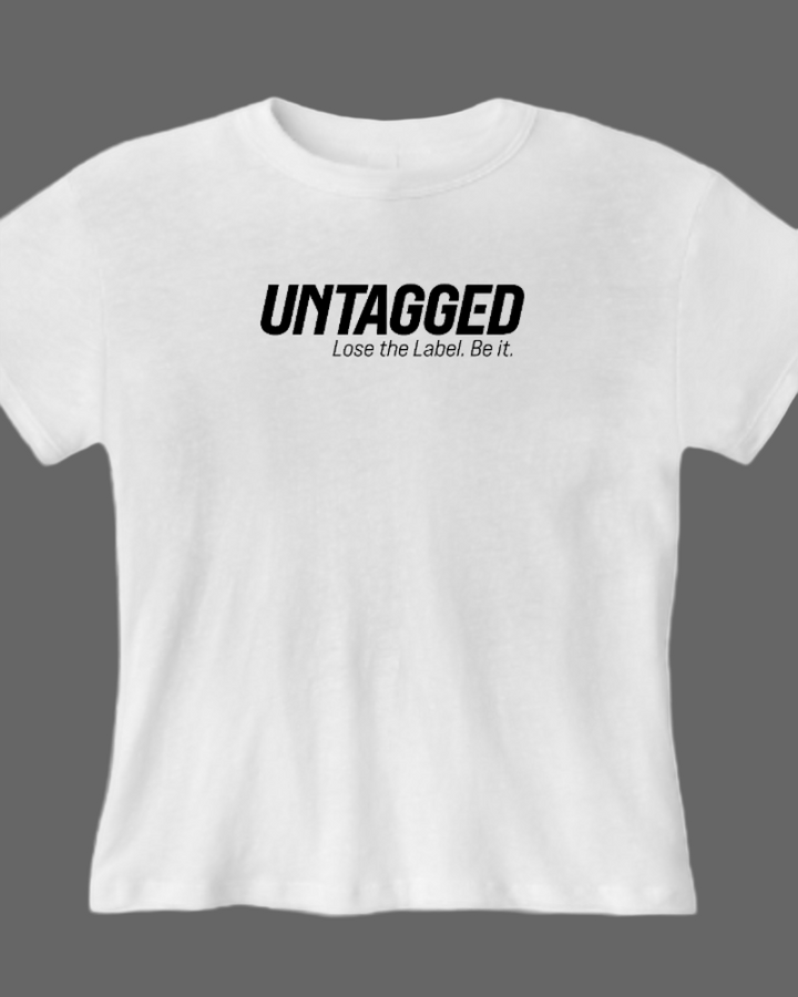White t-shirt with 'UNTAGGED Lose the Label. Be it.' text on a white background