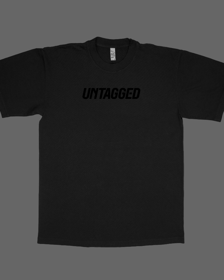 Black t-shirt with 'UNTAGGED' text on a white background