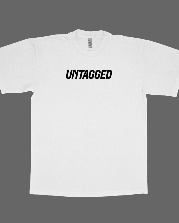 White t-shirt with 'UNTAGGED' text on a white background