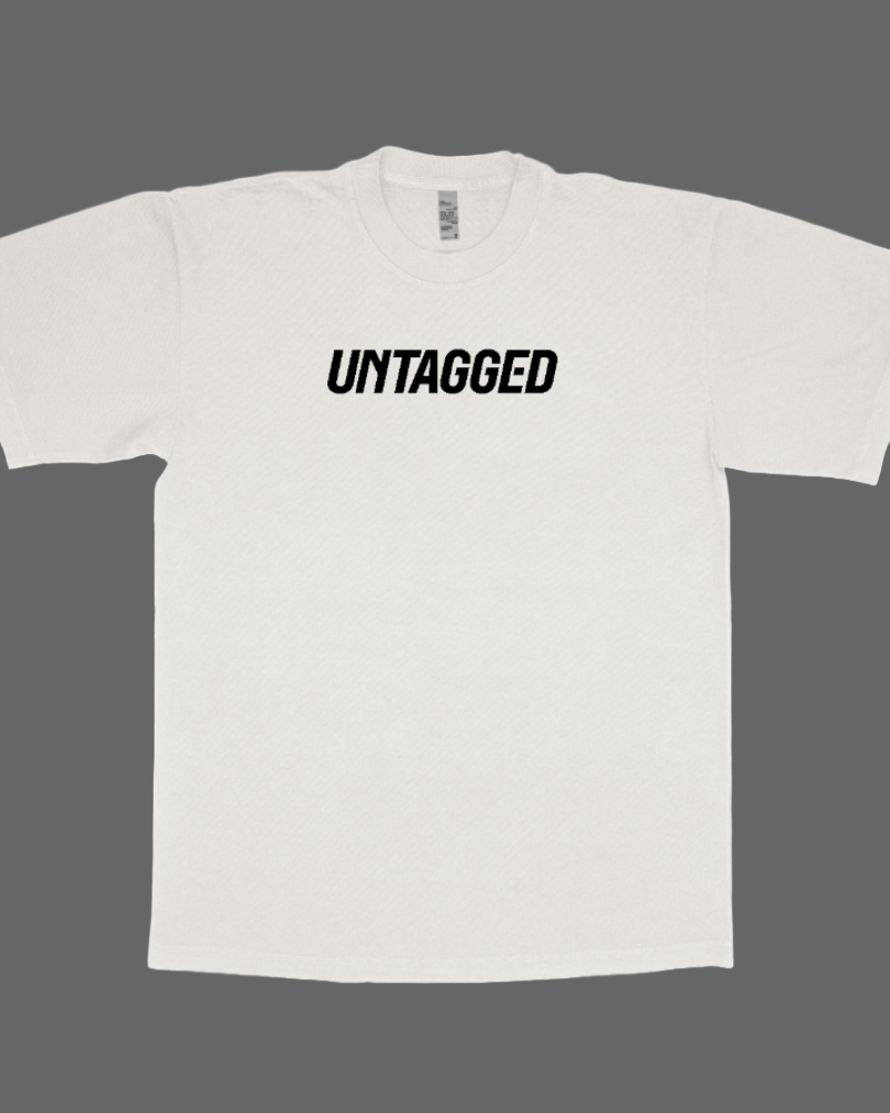 White t-shirt with 'UNTAGGED' text on a white background