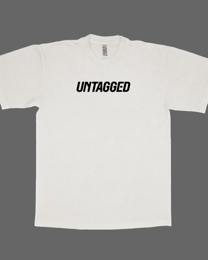 White t-shirt with 'UNTAGGED' text on a white background