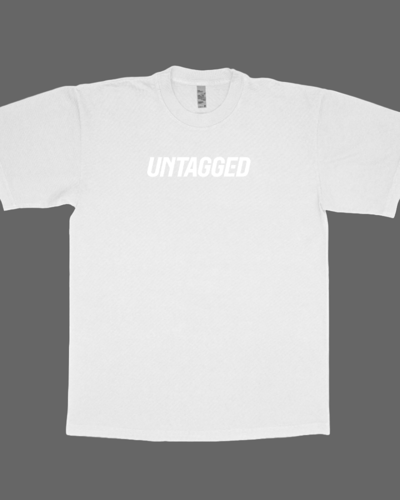 White t-shirt with 'UNTAGGED' text on a white background