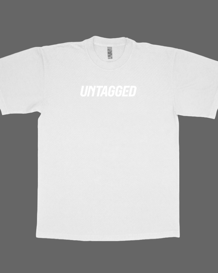 White t-shirt with 'UNTAGGED' text on a white background