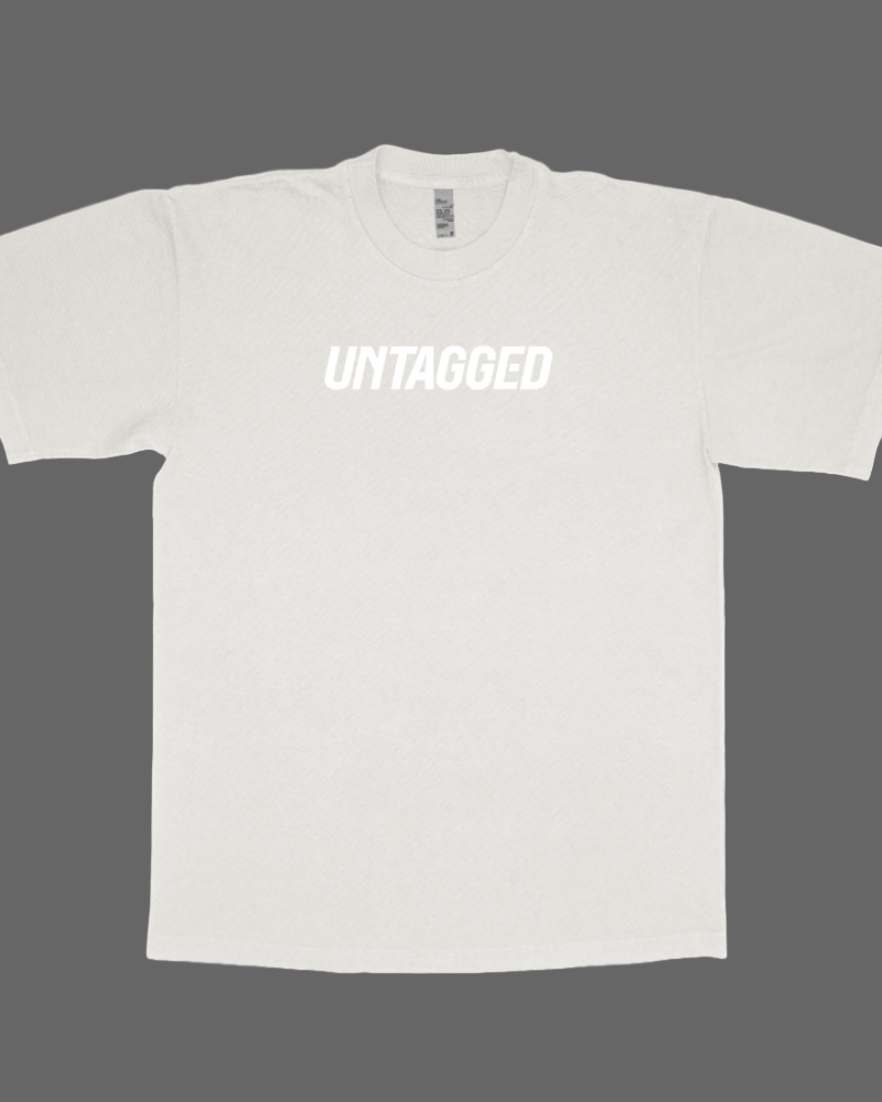 White t-shirt with 'UNTAGGED' text on a white background