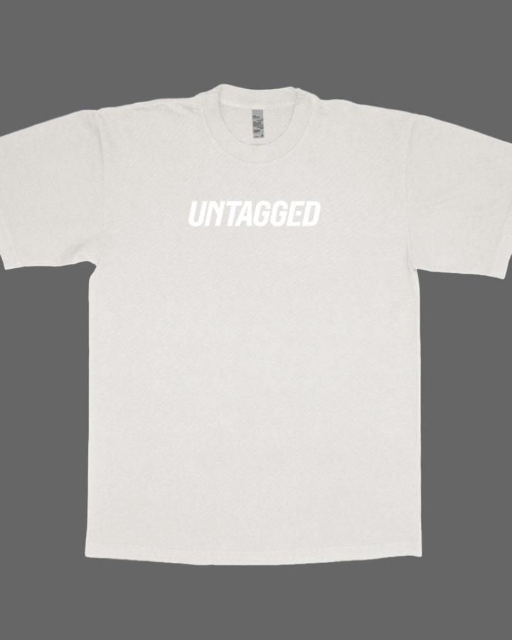 White t-shirt with 'UNTAGGED' text on a white background
