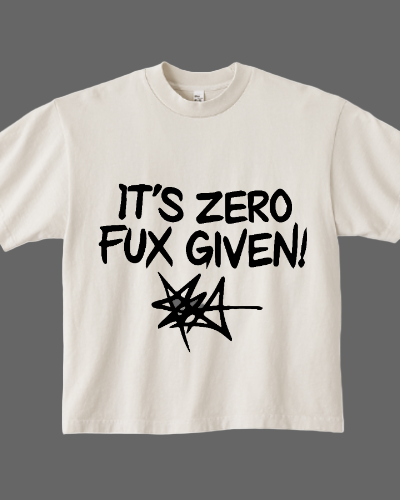 Beige t-shirt with black text 'IT'S ZERO FUX GIVEN!' on a white background