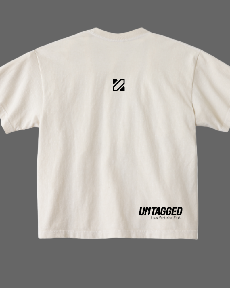 Beige t-shirt with 'Untagged' logo and text on a white background