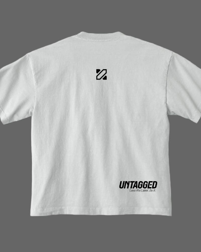 White t-shirt with 'Untagged' logo and text on a white background