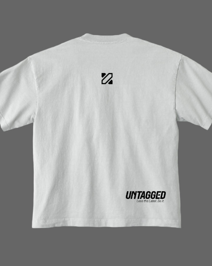 White t-shirt with 'Untagged' logo and text on a white background