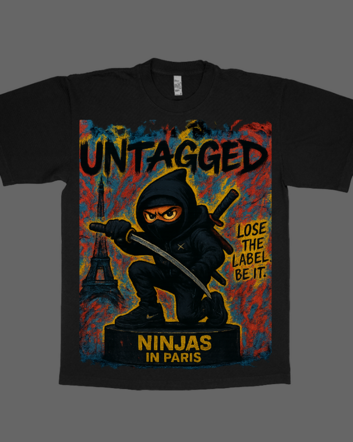 Black t-shirt with a graphic design of a ninja holding a sword, featuring text and the 'Ninjas in Paris' brand.