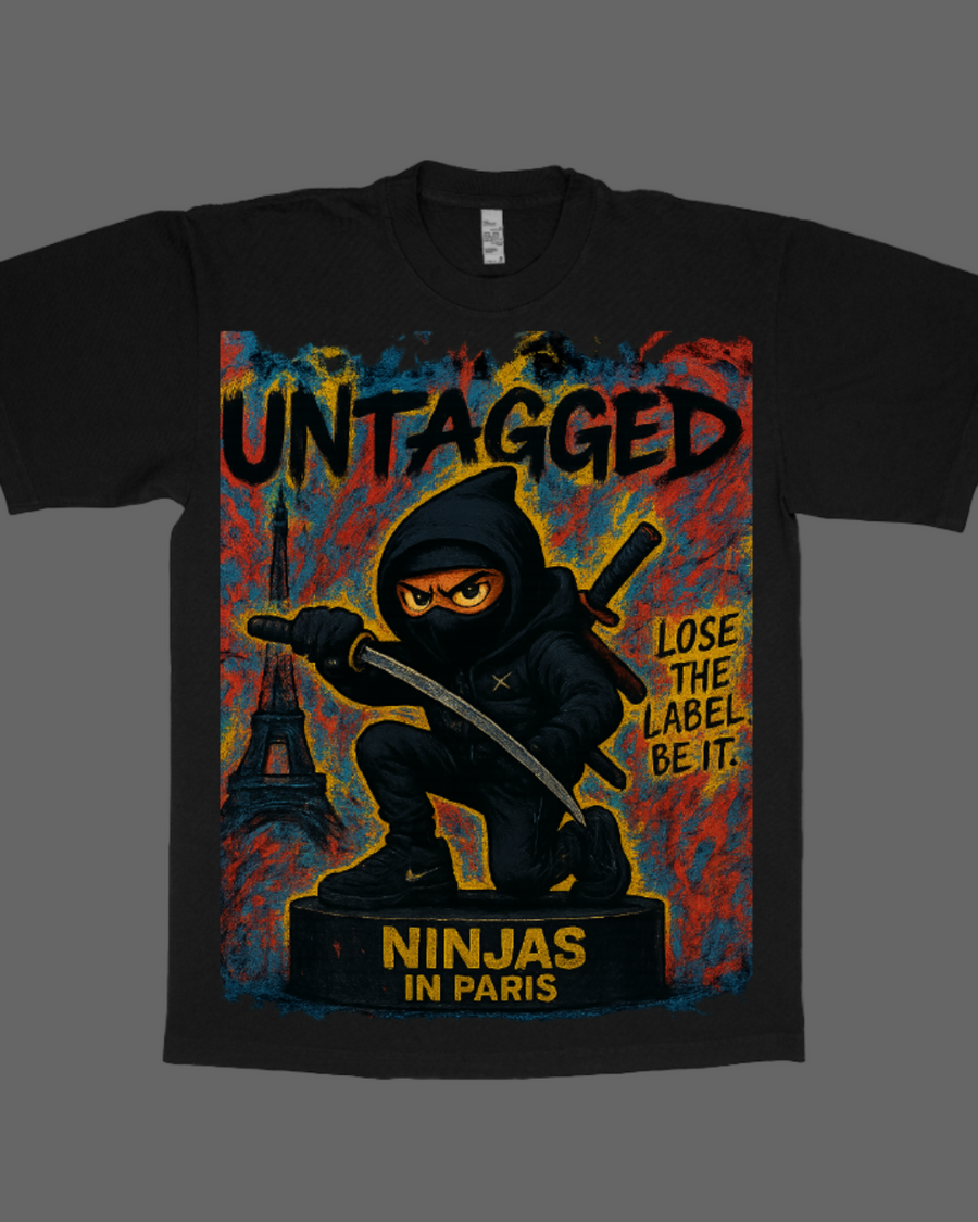 Black t-shirt with a graphic design of a ninja holding a sword, featuring text and the 'Ninjas in Paris' brand.