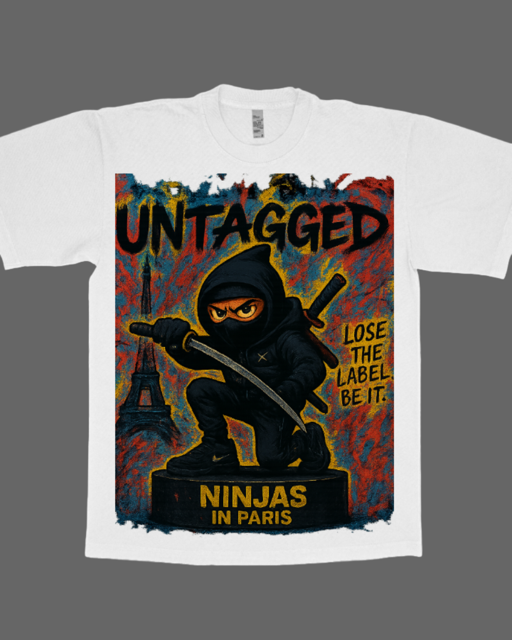 White t-shirt with a graphic design featuring a ninja and text on a white background