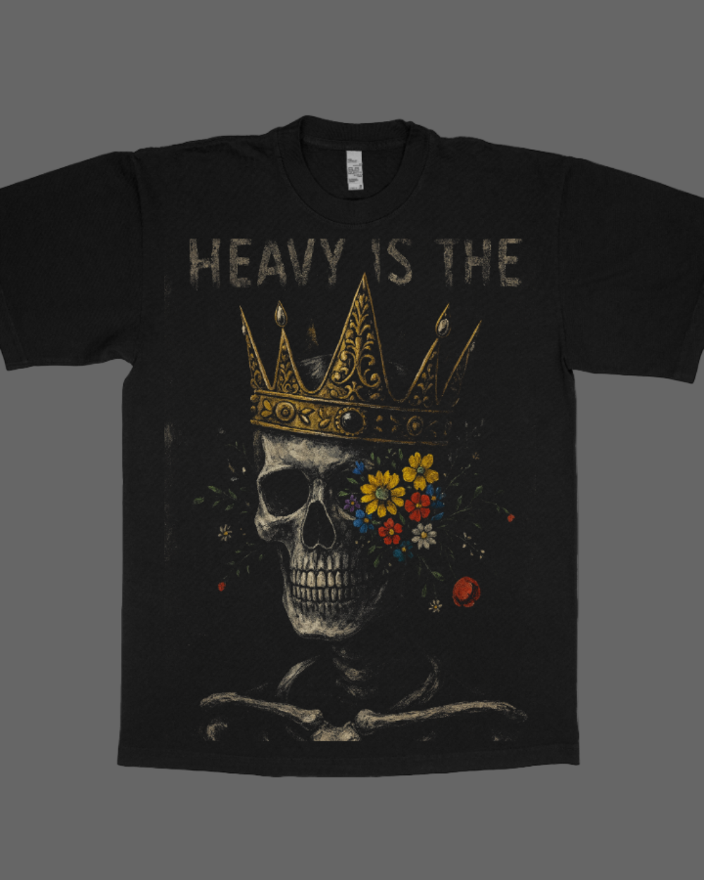Black t-shirt with skull and crown design and 'Heavy is the' text on a white background
