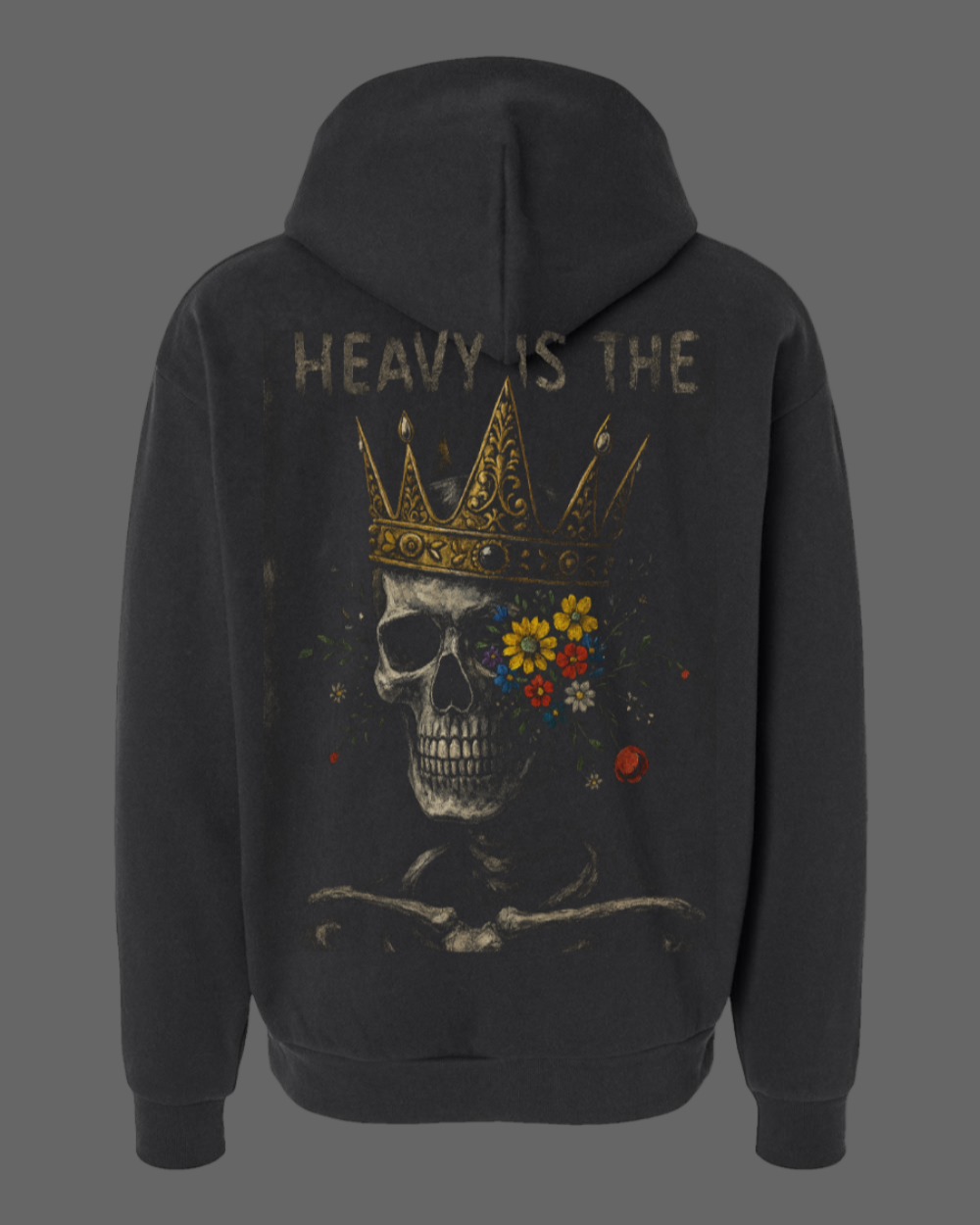 Black hoodie with a skull and crown design on the back, featuring the text 'HEAVY IS THE'.