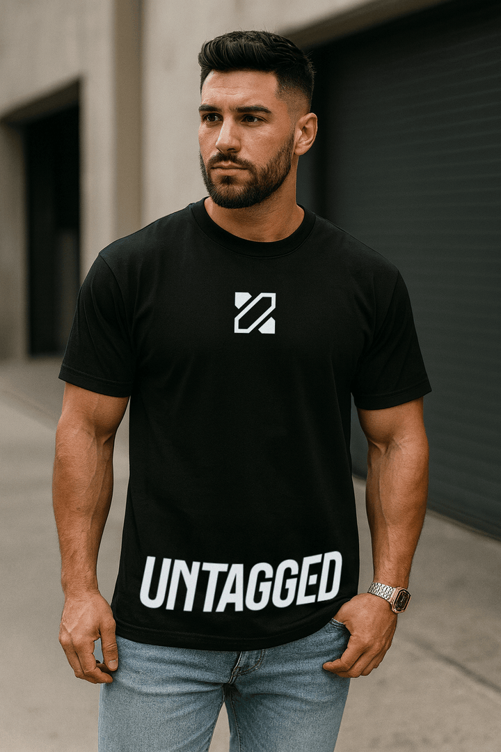Man wearing a black t-shirt with 'UNTAGGED' text and logo.
