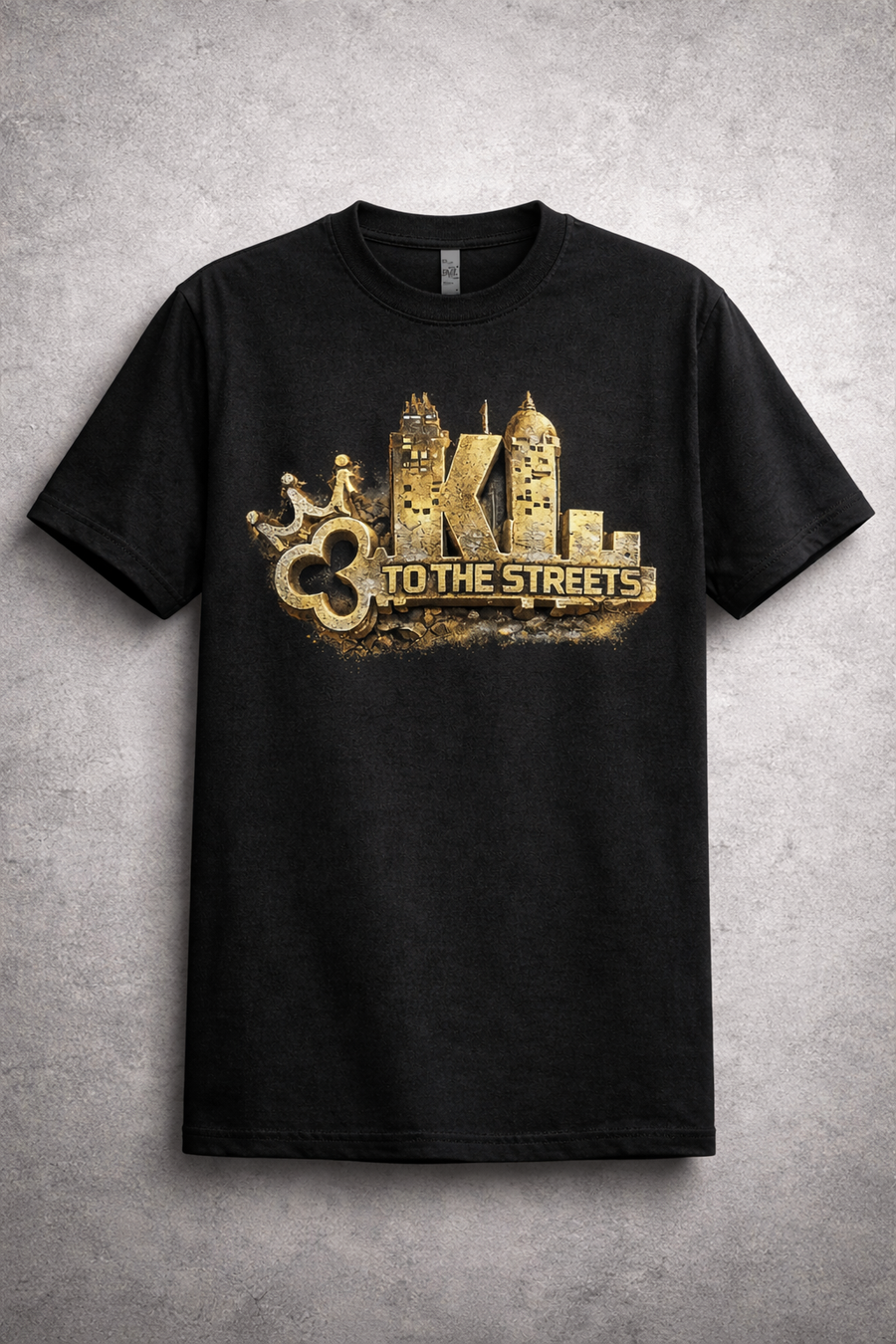 Black t-shirt with gold graphic design on a gray background