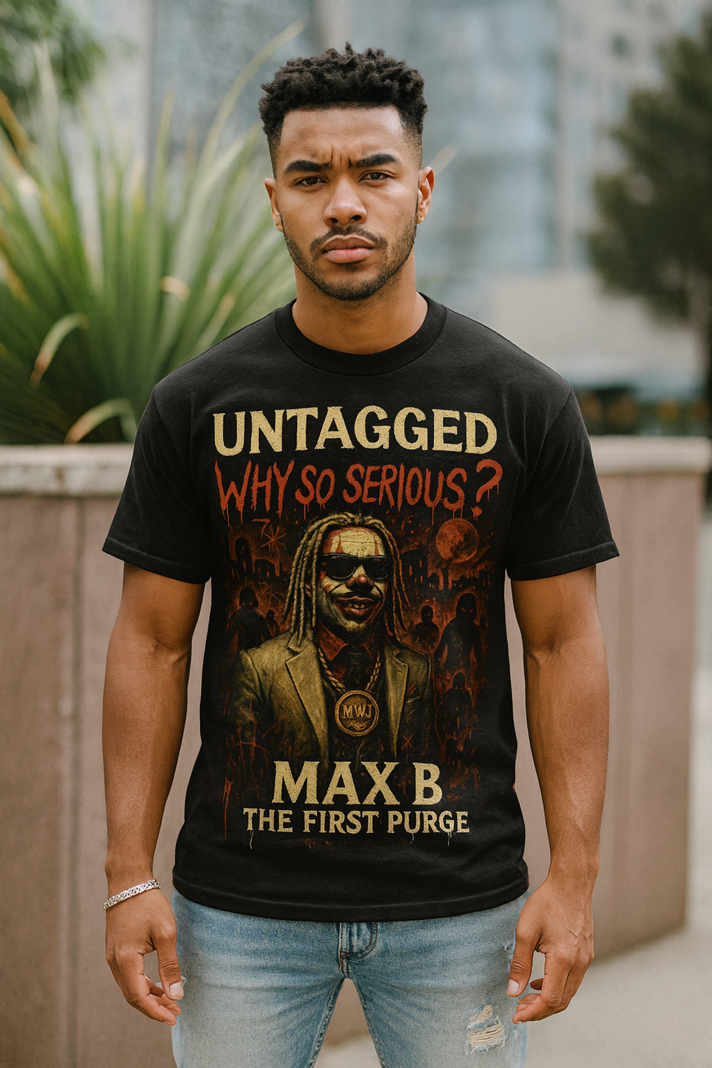 Man wearing a black t-shirt with graphic design and text, standing outdoors.