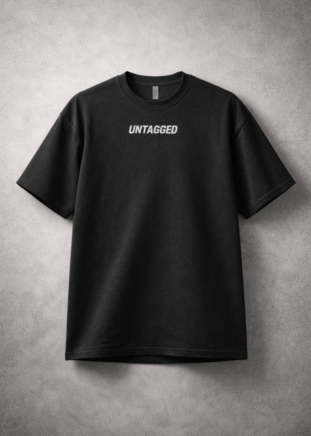 Black t-shirt with 'UNTAGGED' text on a gray background