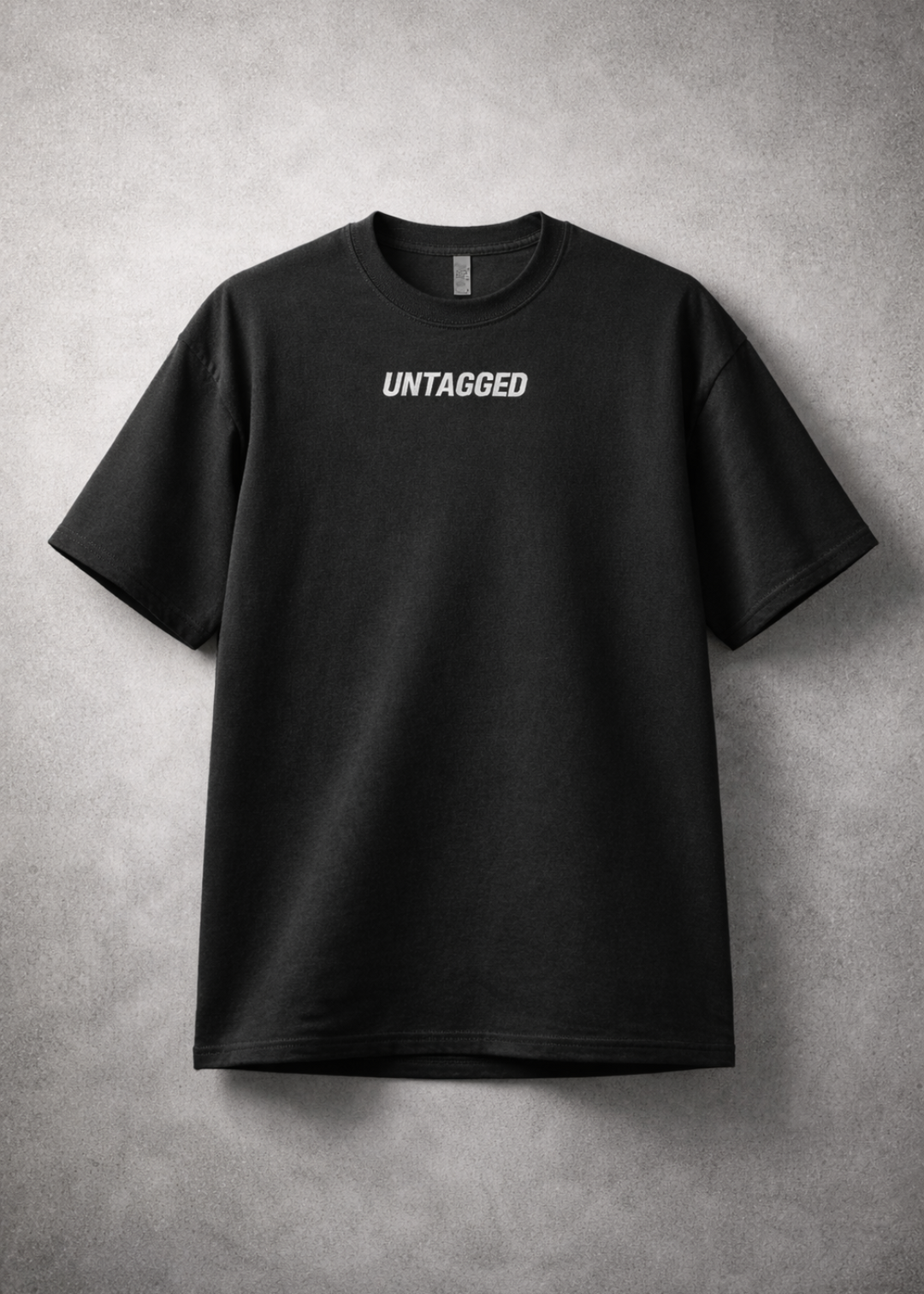 Black t-shirt with 'UNTAGGED' text on a gray background