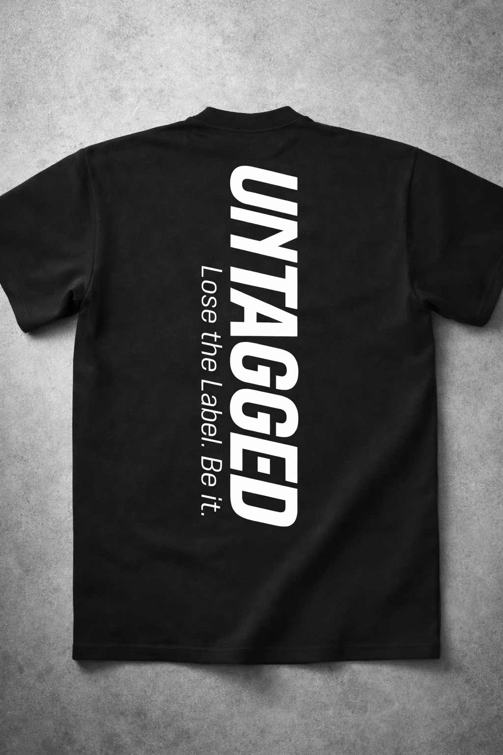 Black t-shirt with 'Untagged' text on a gray background